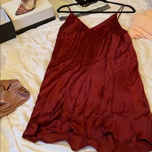 Burgundy flowy dresss. Can be dressed up or down.